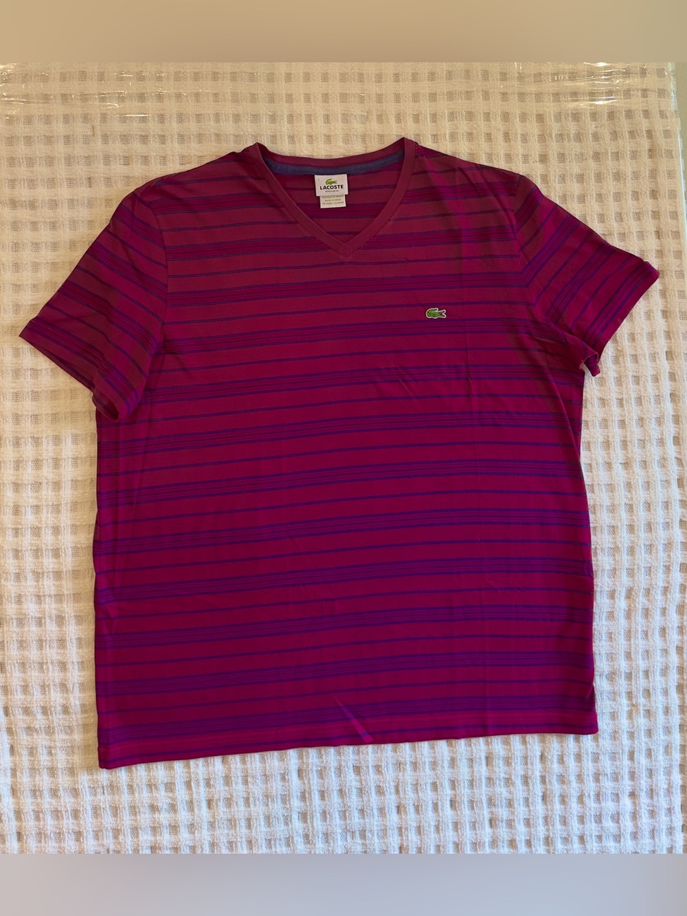 Lacoste Burgundy and Navy Striped V-Neck Tee 23” Tall, 21” Wide, 9” Sleeve, 7 RF
